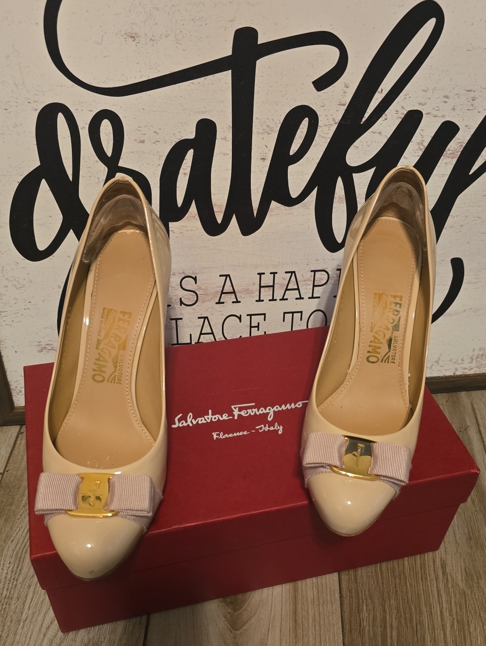 Salvatore Ferragamo Cream Patent Leather Bow Pumps with Gold Hardware